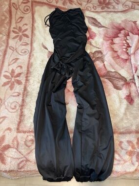 Black Halterneck Jumpsuit with Tie Waist and wide legs